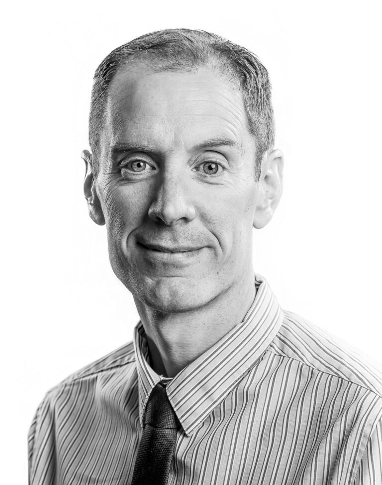 Black and white image of Andrew Hitchen